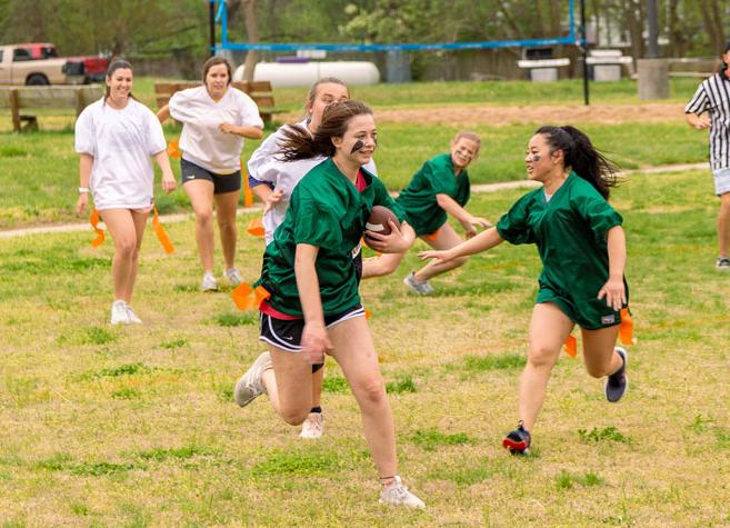 girls playing flag football